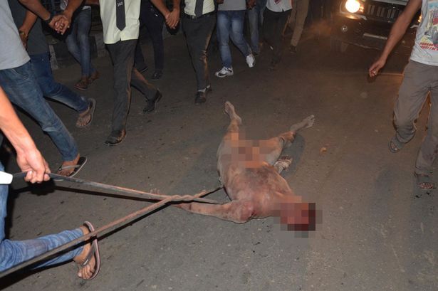 The man, identified as Syed Sharif Khan, was stripped naked, beaten and dragged through Dimapur, Nagaland state's main city, before being hanged.