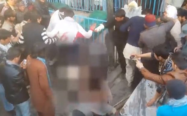   An angry mob in Kabul killed a woman and set her body alight for allegedly burning a copy of the Koran Photo: Radio Free Afghanistan