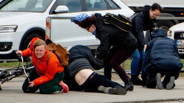 Pedestrians in Munich were blown to the ground by the force of the winds