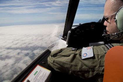 Пилот ВВС Австралии, участвующий в поисках пропавшего «Боинга» Фото: Michael Martina / AFP 