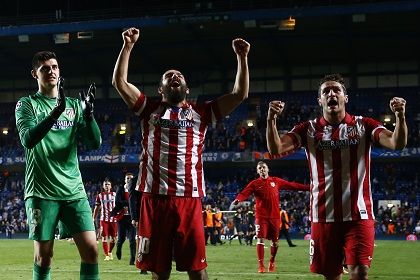 «Атлетико» празднует победу в матче c «Челси» Фото: Eddie Keigh / Reuters