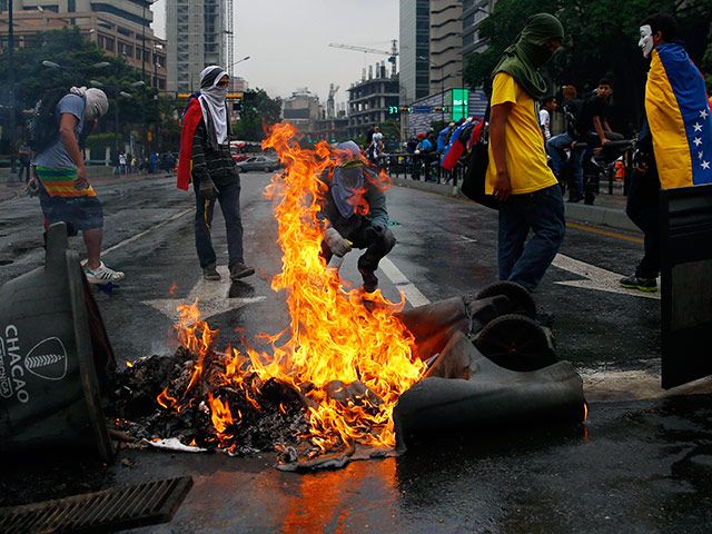 Каракас, 13 мая 2014 года. Фото: Reuters