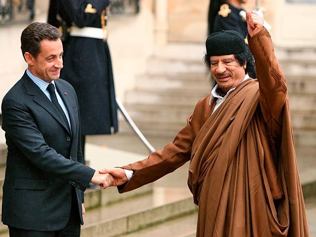 Отправной точкой для предъявления очередных обвинений Саркози послужило судебное разбирательство, начатое в апреле 2013 года. Речь шла о возможном участии бывшего ливийского лидера Муаммара Каддафи в финансировании президентской кампании Саркози 2007 года. Фото Reuters