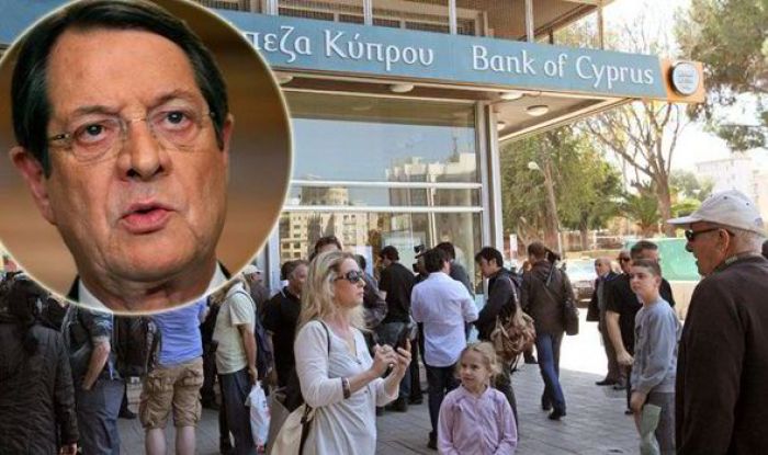 Cypriot President cuts own salary in bid to show his nation's solidarity as banks reopen