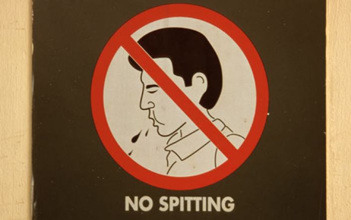 UK journalist - Ban spitting?