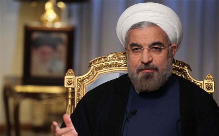 Iranian President Hassan Rouhani offers to broker Syria talks