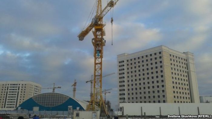 Women climb on crane in Astana to protest house demolition