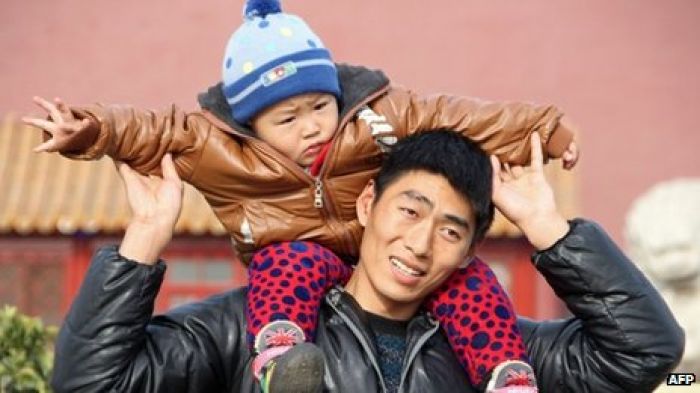 China formally eases one-child policy