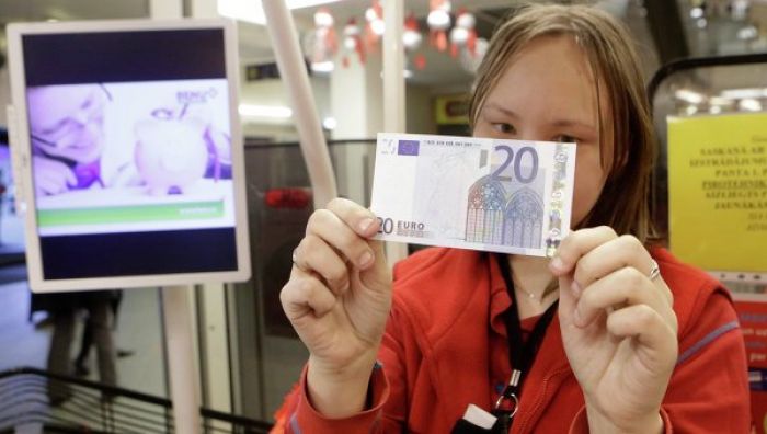 Latvia Reluctantly Joins Euro Zone