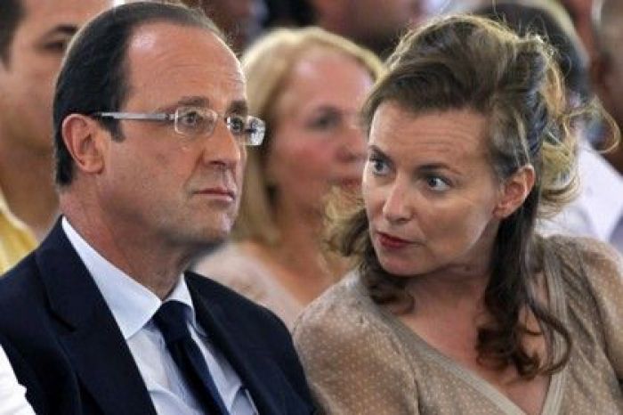 French president says it's over; first lady leaves residence