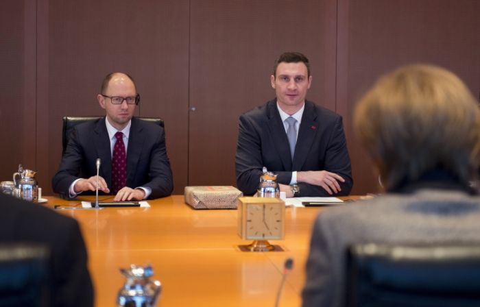 Ukraine opposition leaders meet Merkel in Germany