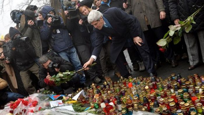 Kerry honors heroes, pledges cash, scolds Putin during brief Kyiv visit