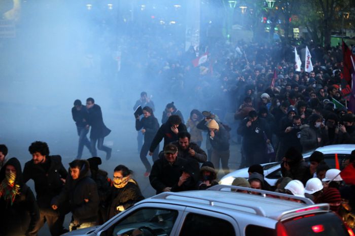 Protesters clash with police across Turkey as thousands mourn 15yo teen death