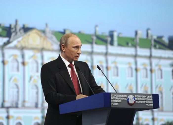 Putin seeks better ties with West but blasts U.S. over Ukraine