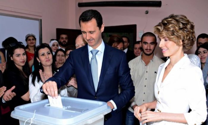 Bashar al-Assad wins re-election in Syria as uprising against him rages on