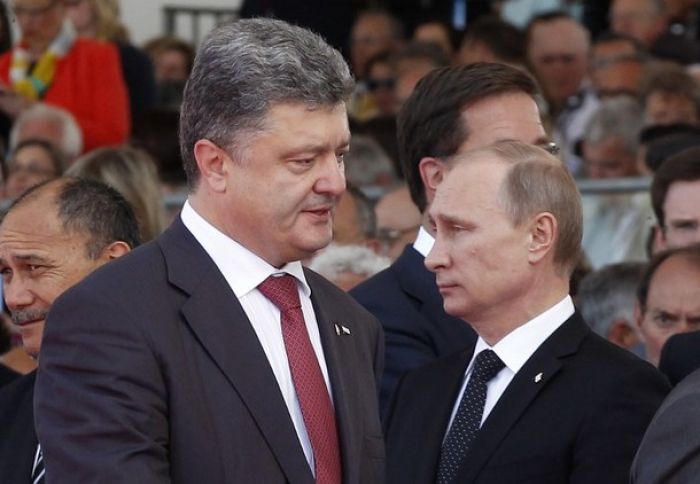 Putin, Poroshenko discuss peace plan, journalist deaths