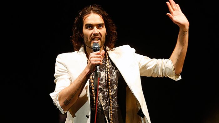 ‘Revolution is inevitable’: Russell Brand hits Wall Street, kisses RT interviewer (VIDEO)