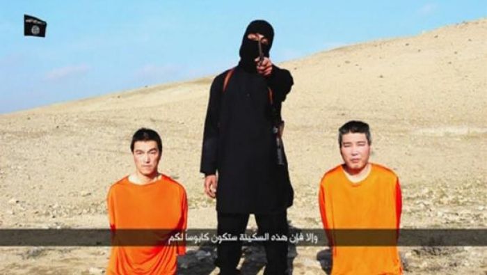 Islamic State threatens to kill 2 Japanese captives , demands $200 mil. ransom