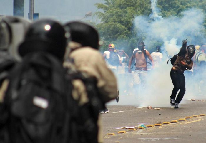 Clashes erupt on anniversary of Venezuela protests