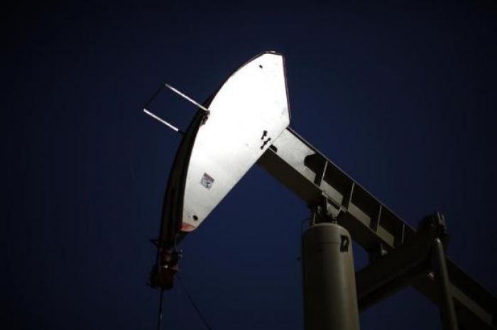 Brent rises above $61, set for first monthly gain since July