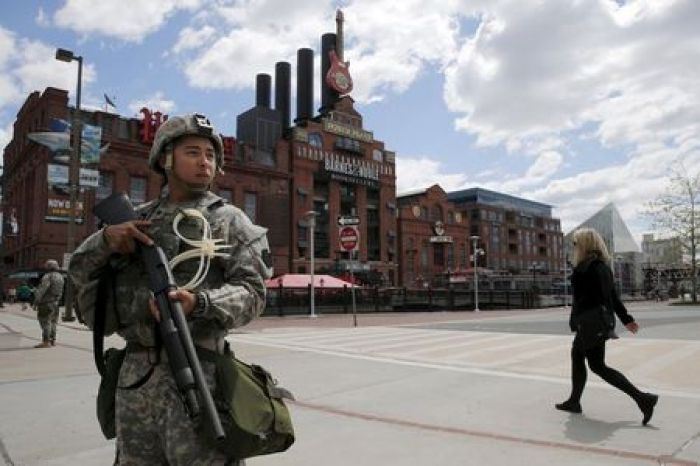 Police enforce curfew in Baltimore, disperse protesters