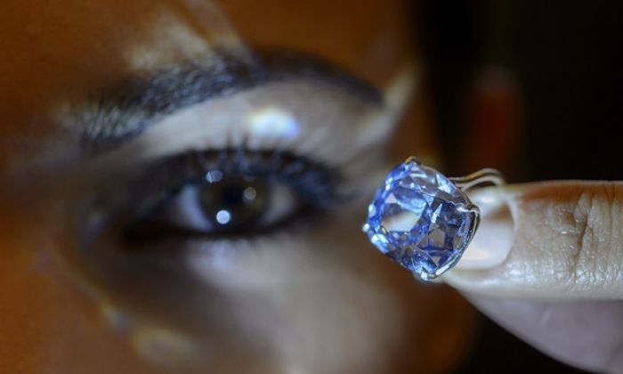 Billionaire buys 7-year-old daughter Blue Moon diamond for record $48m