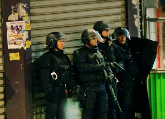 Gunfire erupts in St Denis area of Paris as police hunt fugitives 