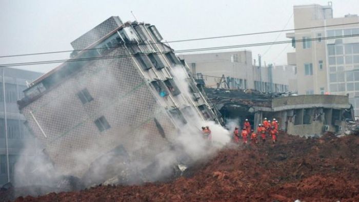 Scores missing after mudslide buries buildings in China