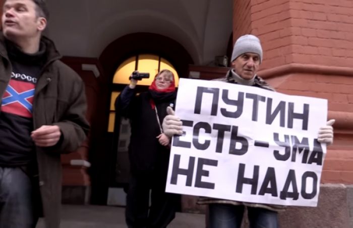 Russian Activist Facing Protest Charges Flees To Ukraine
