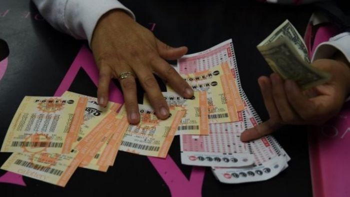Winning tickets sold in historic $1.5bn US Powerball lottery
