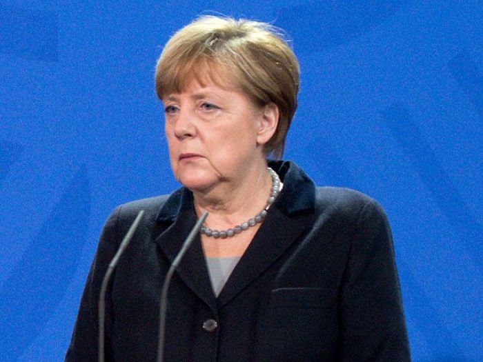 Меркель: Ресейге қарсы санкцияны әзір алмау керек