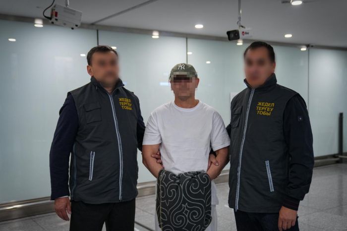 КНБ экстрадировал подозреваемого в особо крупном мошенничестве