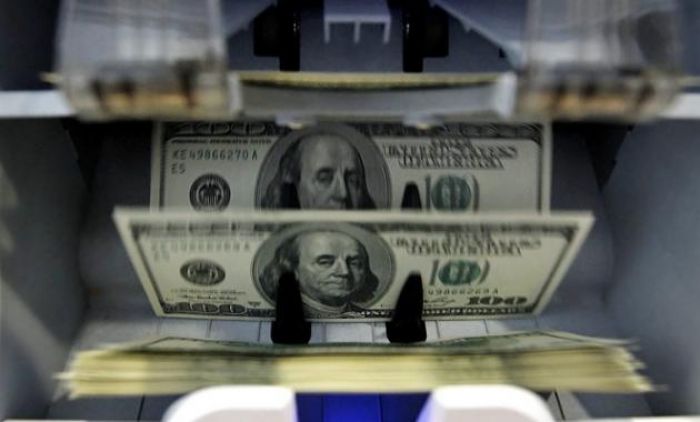 В декабре казахстанцы купили через обменные пункты $4,097 млрд