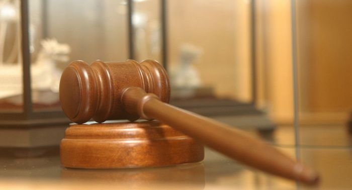 Экс-заместителя руководителя департамента юстиции Астаны осудили на 3 года колонии за взятку