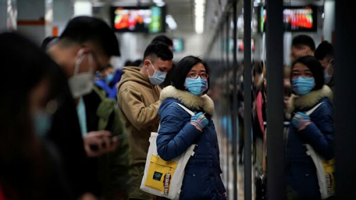 Число заразившихся коронавирусом в Китае увеличилось за сутки на треть